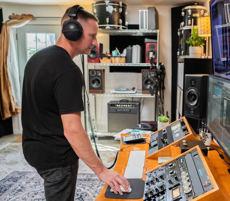Sam Sterk at his mixing console in Vista, CA